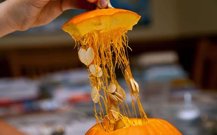 drawing-design-onto-pumpkin