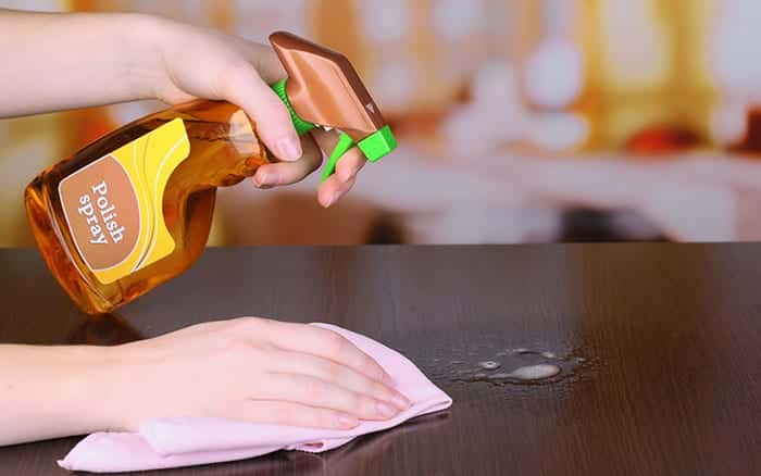 Furniture polish used on a table